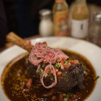 Elote Cafe signature dishes EloteSmoked Brisket EnchiladasDuck Carnitas
